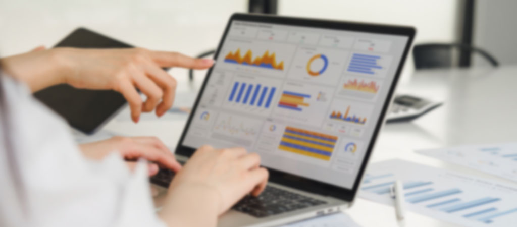 Professionals analyzing people analytics with charts and graphs, making data-driven decisions for business insights